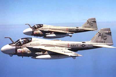 A PAIR OF S/A-6E INTRUDERS ON PATROL OVER TERRA.